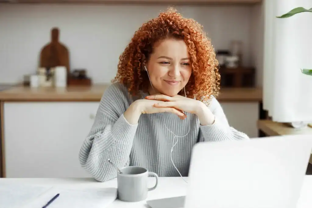 A person attending a remote outpatient mental health consultation from home